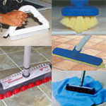 grouping of grout brushes on tile