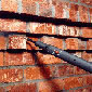 Steam clean brick walls