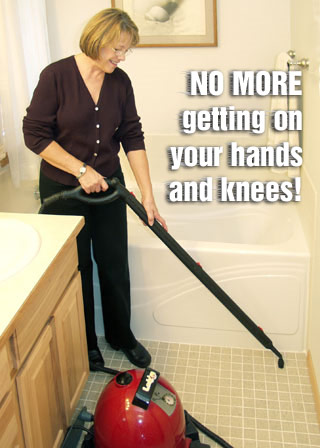 Woman cleaning bathroom steam cleaner